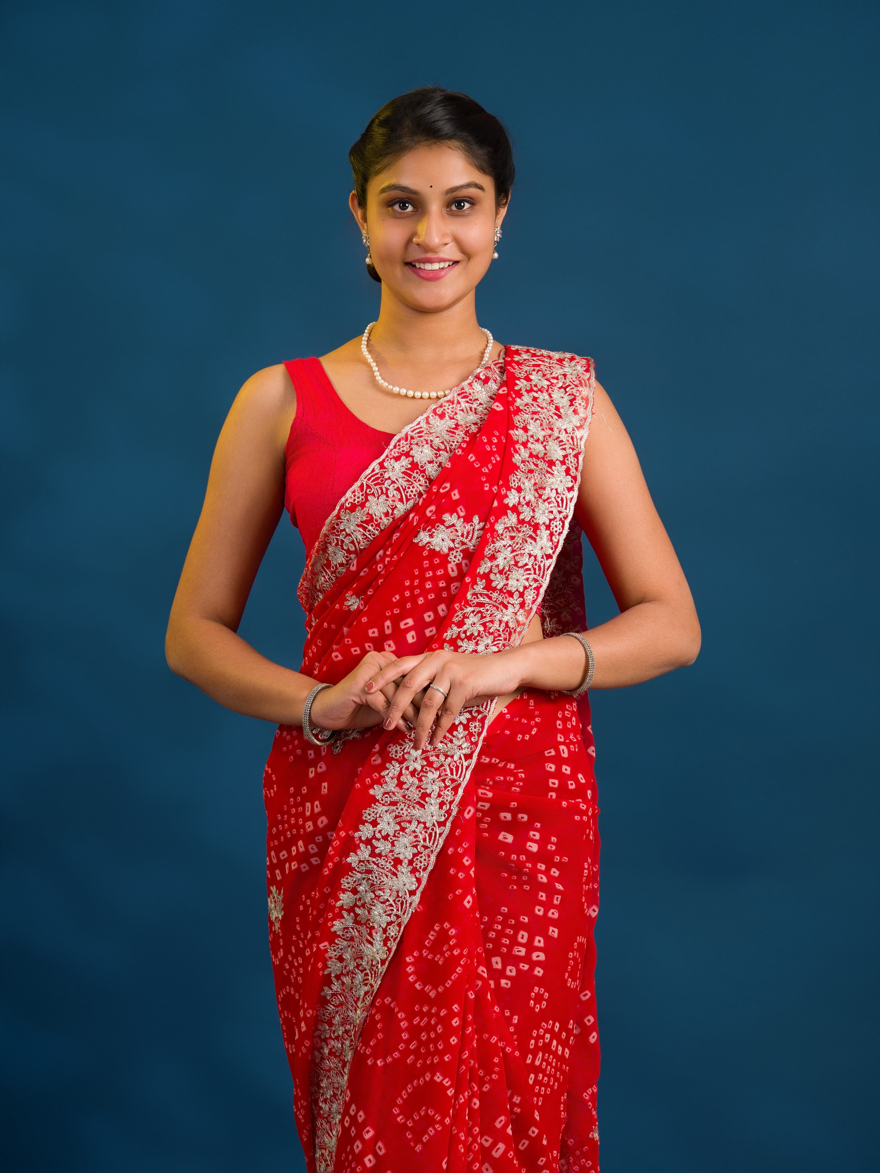 By Bandhani Saree With Elegant Peturn Work