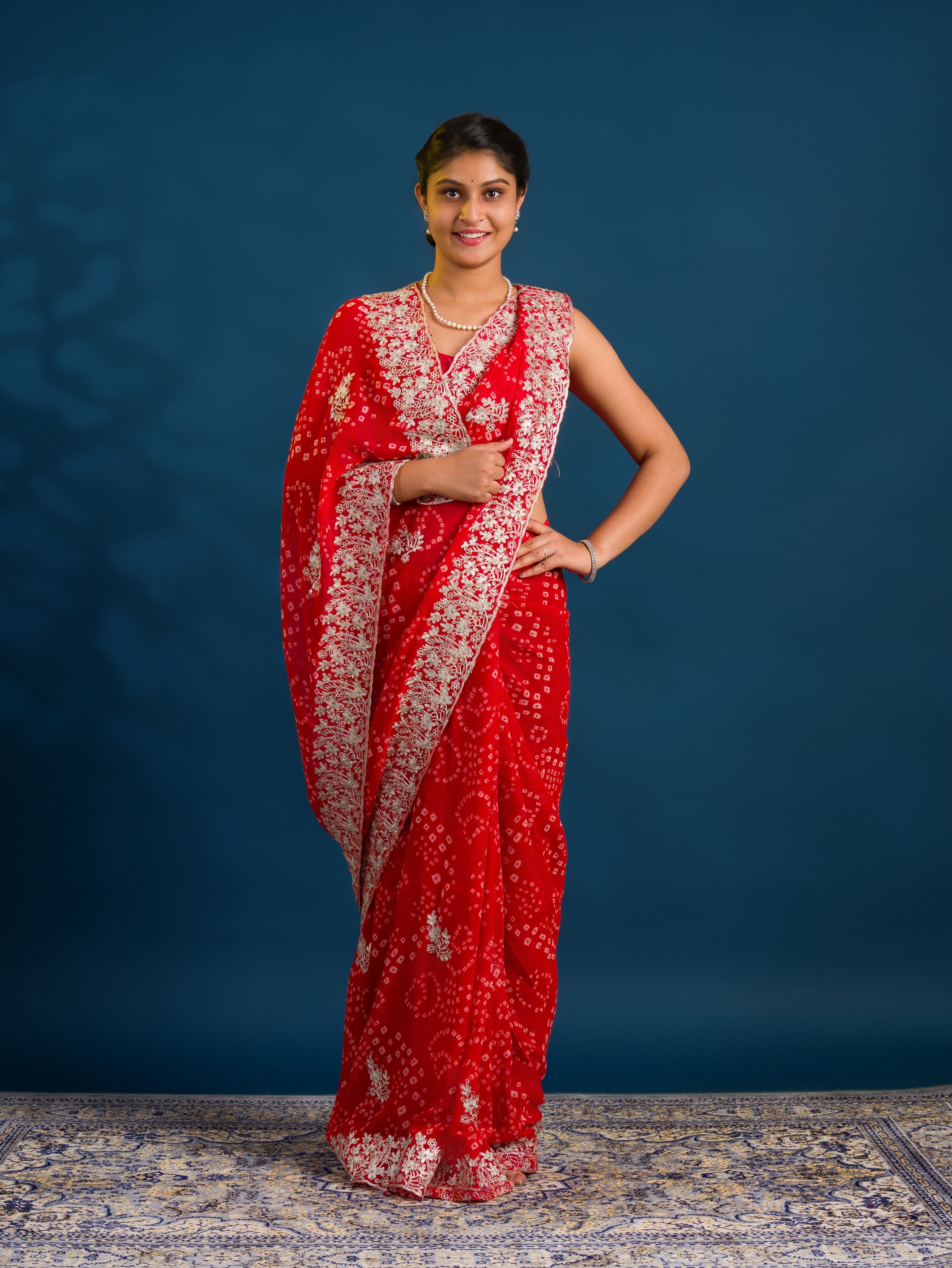 By Bandhani Saree With Elegant Peturn Work