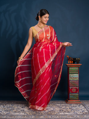 Red saree with gold patterns   Organza Leheriya Style With Gotapatti Work 