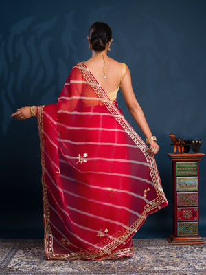 Red saree with gold patterns   Organza Leheriya Style With Gotapatti Work 