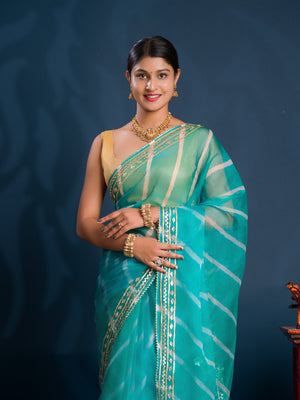 Teal sareewith Silver  patterns   Organza Leheriya Style With Gotapatti Work 