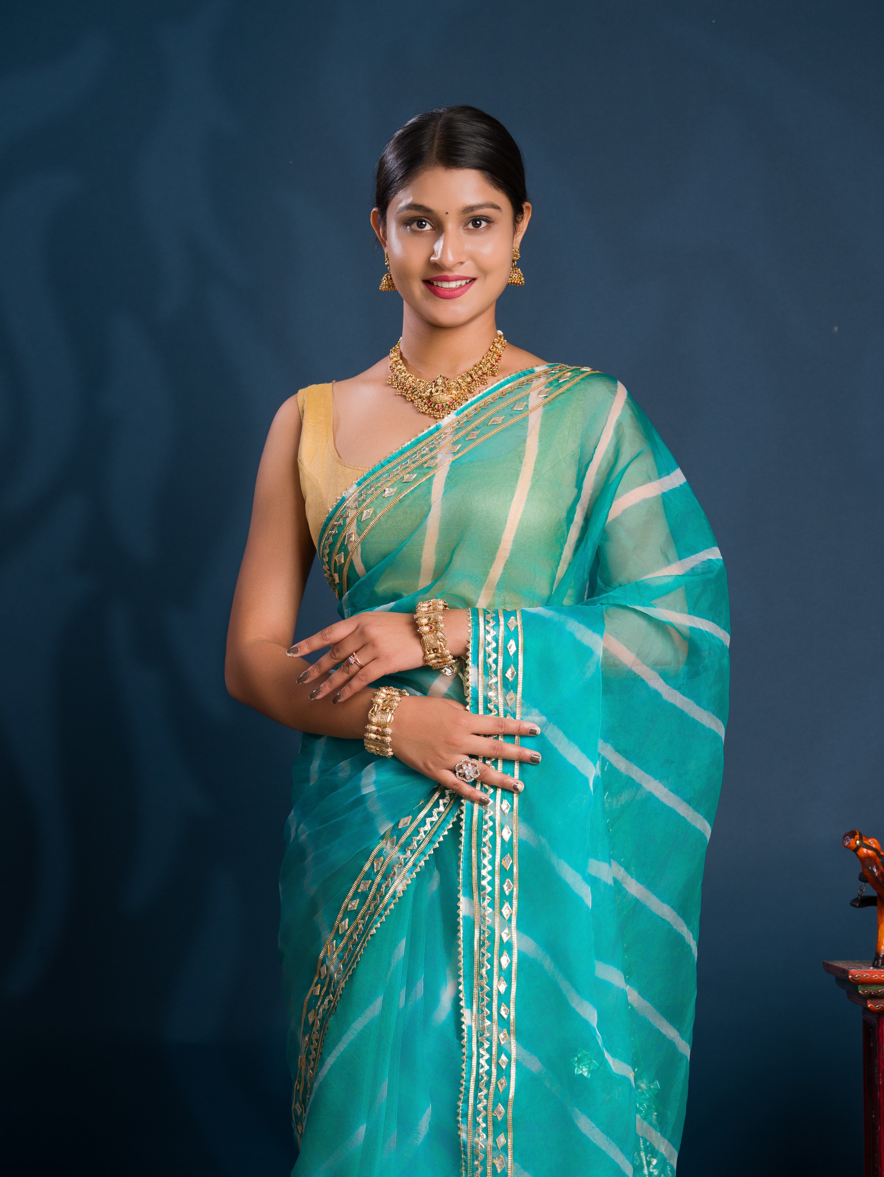 Teal sareewith Silver  patterns   Organza Leheriya Style With Gotapatti Work 