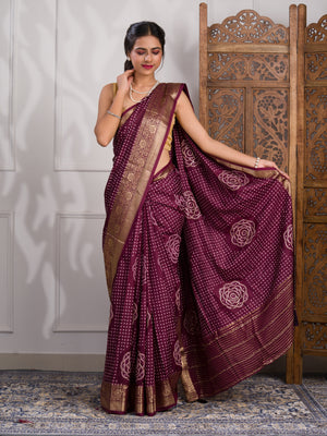 A wine and gold Upada silk saree with Bandhani style 