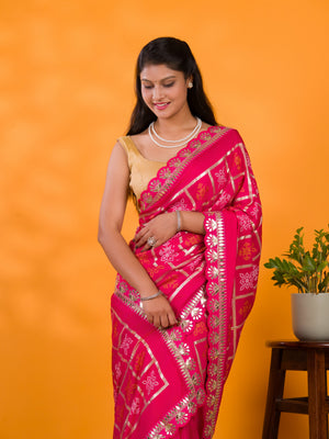 A pink saree with white patterns with  Cotton silk Bandhani Gotapatti Work Saree