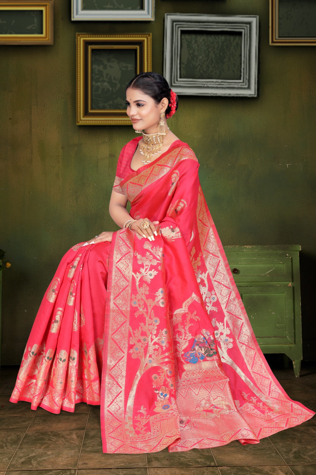A  red and orange Banarasi saree with zari weaving and floral patterns, 