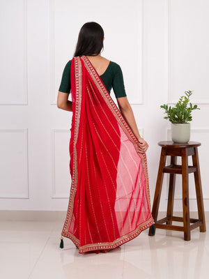 Red saree with gold border