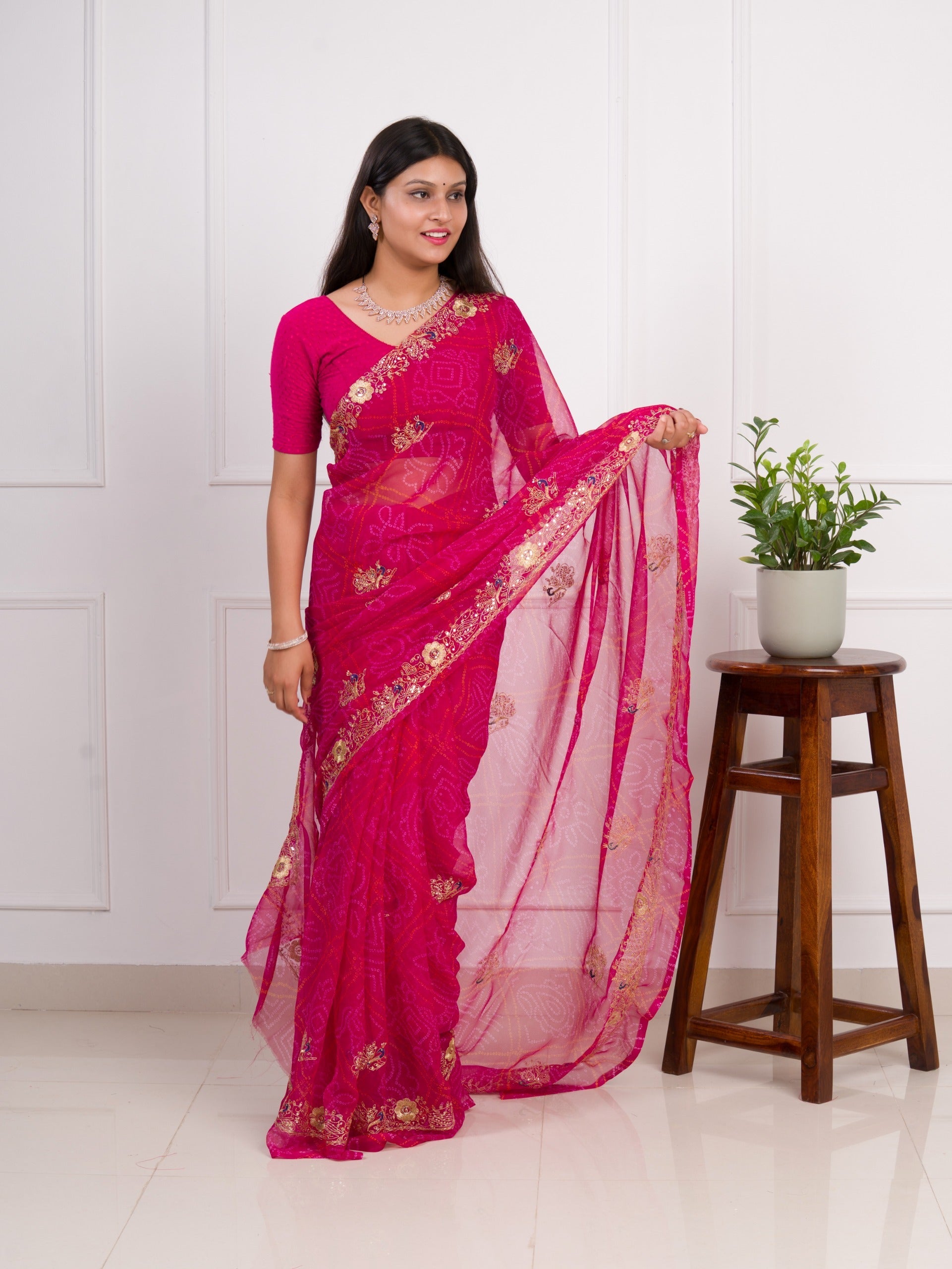Tanmira latest Royal Pink Bandhani Georgette Saree with Golden Embellishments JAY
