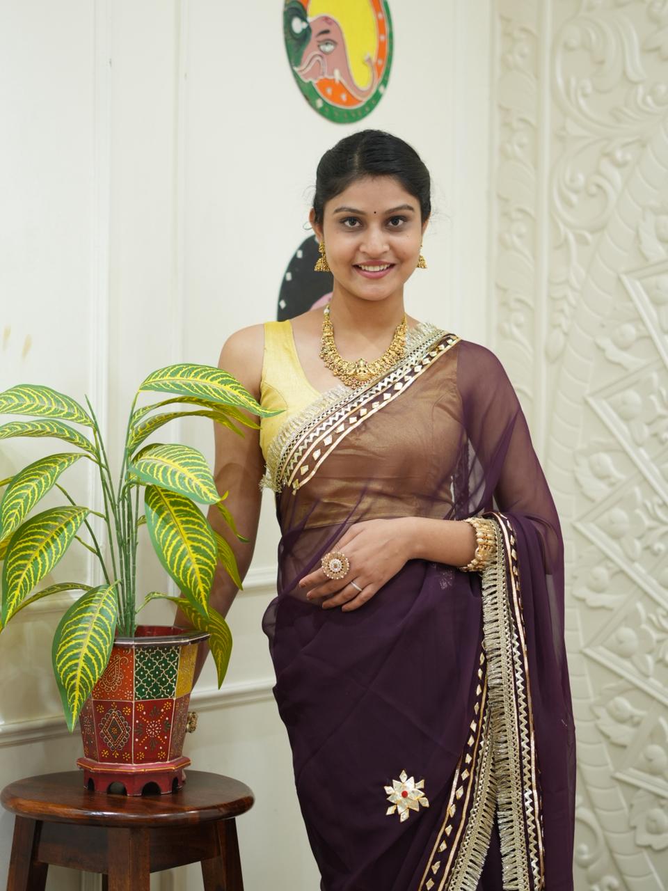 Traditional saree with Gotapati Work in wine colour